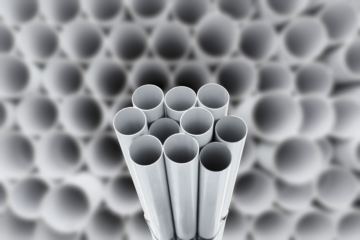 PVC Pipes Stacked in Warehouse